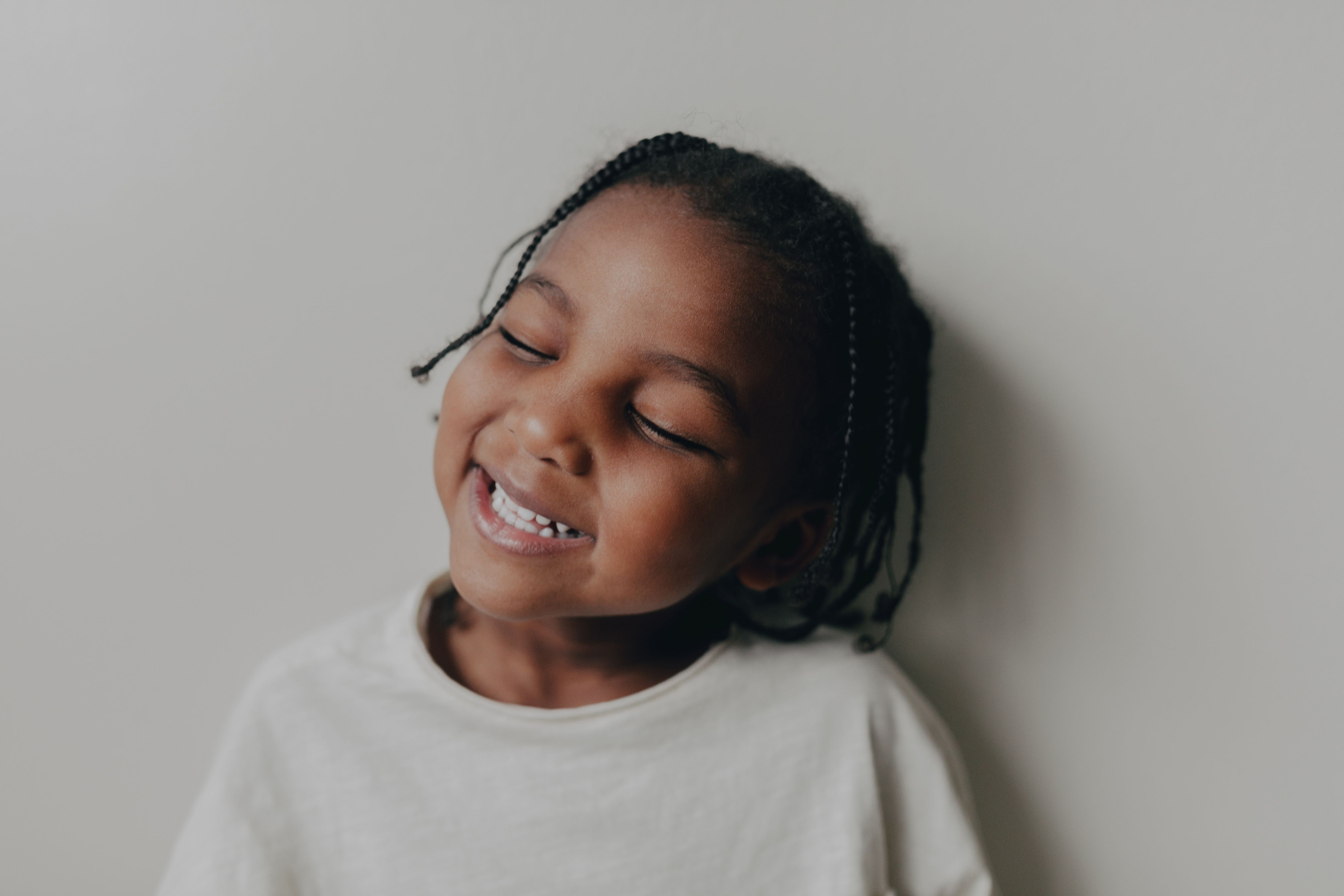 Happy child after first dental visit at Smile Essence