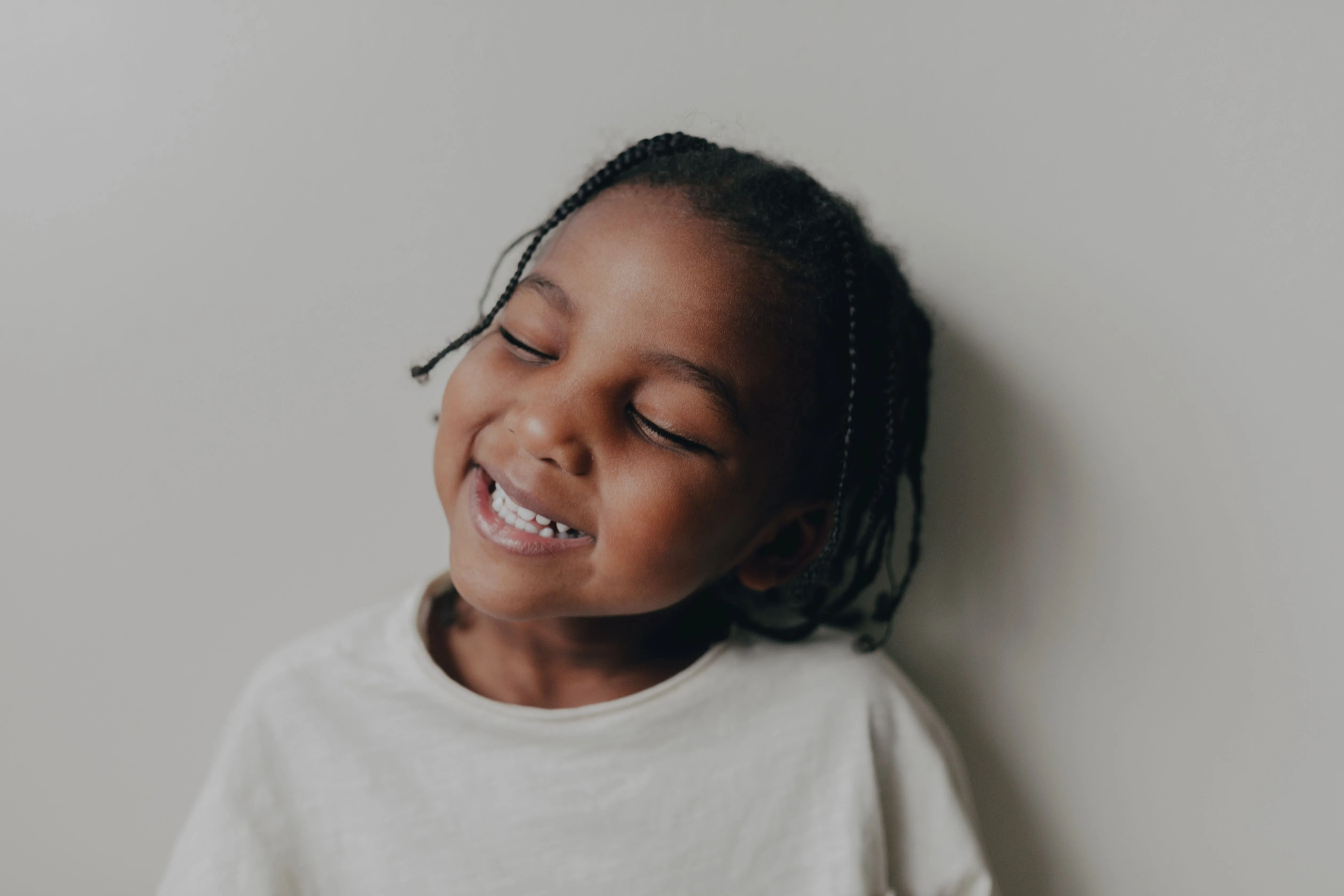 Happy child after first dental visit at Smile Essence
